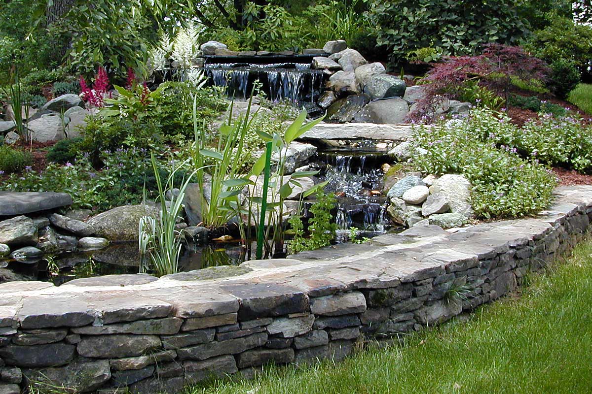 The Natural Landscape Inc. – Pennsylvania fieldstone pool and waterfall